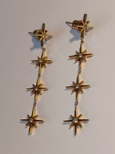 Orecchini pendenti con stelle