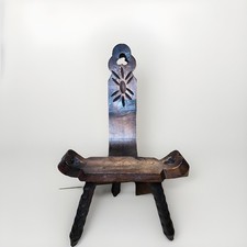 Poltrona laterale tre gambe