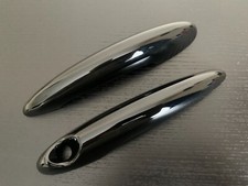 COPRIMANIGLIE NERO LUCIDO 2