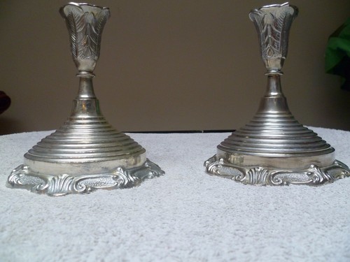 Coppia candelabri argentati - di,