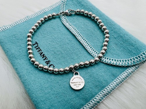 Return tiffany round tag - return,