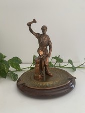 Gros cendrier avec statuette