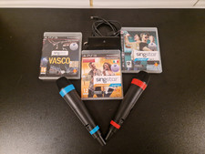 Playstation 3  due Microfoni senza filo  2 Sing star  1 Vasco come nuovi  