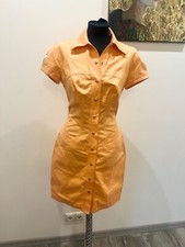 VINTAGE SCULTOREO THIERRY MUGLER marchio arancione taglia M/L?