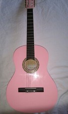 Stealton- chitarra classica rosa- comprata mai usata + plettro rosa 