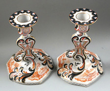 Paire bougeoirs faïence saint - paire,
