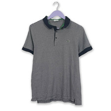 Polo Lacoste a righe bianche e