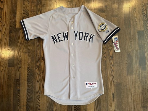 Maglia grigia nuova con