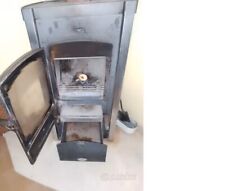 stufa a legna in ghisa usata