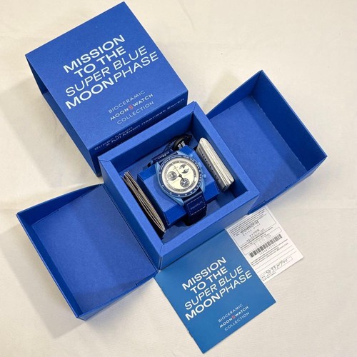 Swatch omega mission the - x,