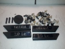 Lotto ricambi Lancia Dedra fregi, clips, tappo olio, cappucci chiusure sportelli