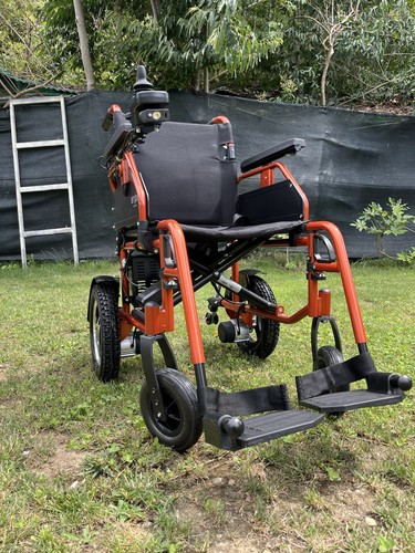 Carrozzina elettrica - carrozzina,