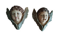 Coppia di volti d'angelo in