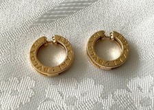 Orecchini a cerchio grandi Bvlgari B.Zero1 oro giallo 18 kt 28 diamanti totale 0,36 carati
