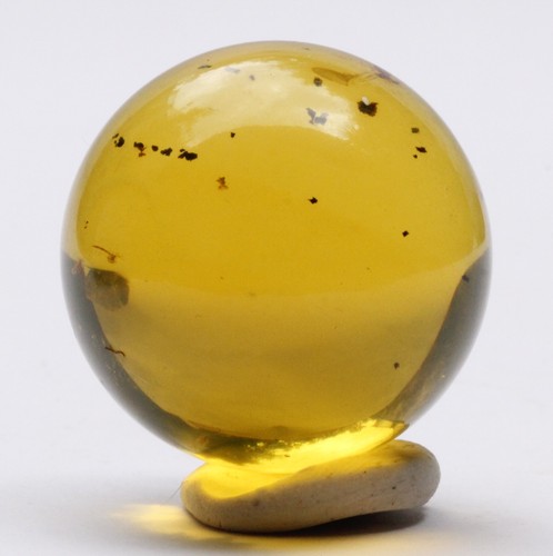 Sfera calibrata in ambra - in,