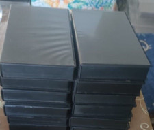 10 contenitori custodie nere e rilegati in plastica per cassette