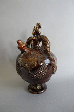 Ancienne gargoulette en terre