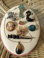 9 PEZZI DI BIGIOTTERIA TRA CUI ARGENTO