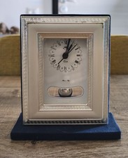 Orologio a pendolo da tavolo rivestito in argento