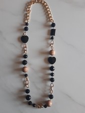 Collana media lunghezza onice nero e catena dorata 