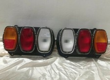 COPPIA FARI FANALI POSTERIORI FIAT 128 3p coupé NUOVI originali 
