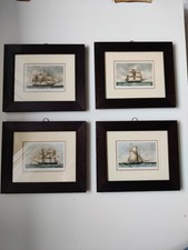 Quattro quadri con stampe di