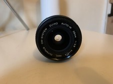 OLYMPUS OM SYSTEM MOUNT ZUIKO AUTO-W 28mm f2.8 PRIMO GRANDANGOLARE (OBIETTIVO NITIDO)