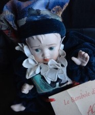 bambola in porcellana da