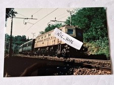 Fotografia Locomotore Elettrico FS E 428 di 2° serie con carrozze Centoporte 