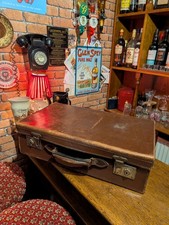 Valigia vintage media in pelle