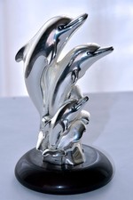 SCULTURA DELFINI su onde marine delle “Argenterie Camilletti”