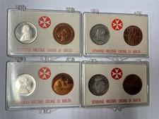 LOTTO COMPOSTO DA 4 FOLDER DI MONETE DI MALTA IN ARGENTO E IN BRONZO (NO ORO)