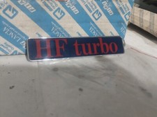 LOGO ORIGINALE EMBLEMA FREGIO STEMMA SCRITTA BADGE LANCIA DELTA 1.6 HF TURBO