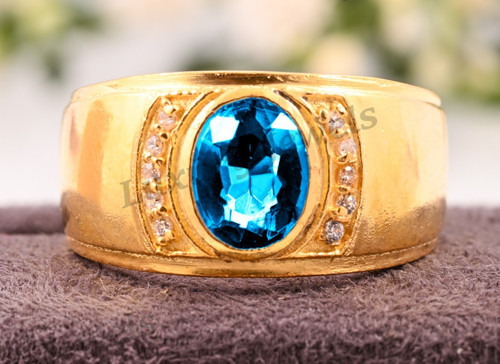 Anello uomo topazio blu