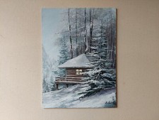 Casa di caccia innevata in