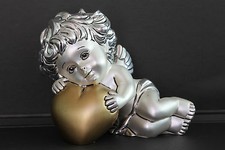 PUTTO ARDE' COLLEZIONE ANGELI  MICHELANGELO IN RESINA ARGENTATA E DECORO IN ORO