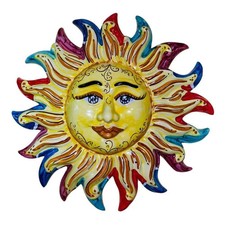 Sole con raggi colorati