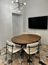 Tavolo in legno rotondo allungabile