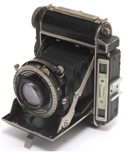Macchina fotografica - @,