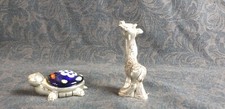 Coppia di animali tartaruga e giraffa laminate in argento