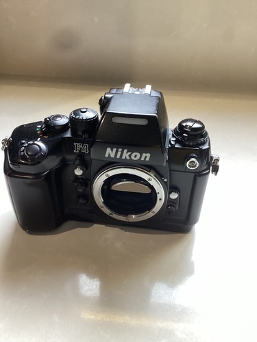 Nikon - , f4