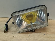 UNE OPTIQUE DE FEU PHARE AVANT