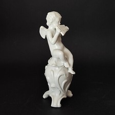 Figurine - Puttino player with