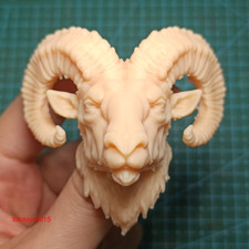 Scultura testa animale pecora