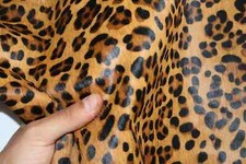 Tappeto pelo di mucca su pelle