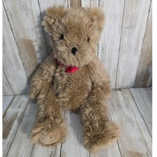 Peluche peluche fiocco rosso