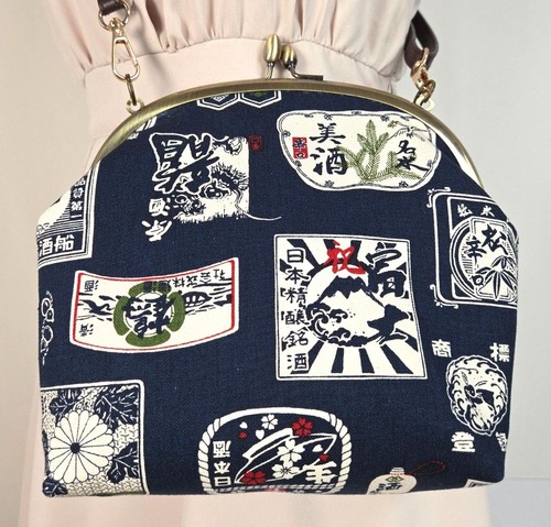 Borsa tracolla sake - a, modello