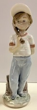 Lladro #7610 "Can I Play" Boy