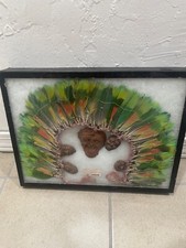 Copricapo piuma pappagallo