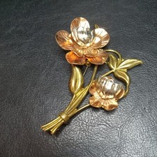 Spilla mazzo di fiori tono